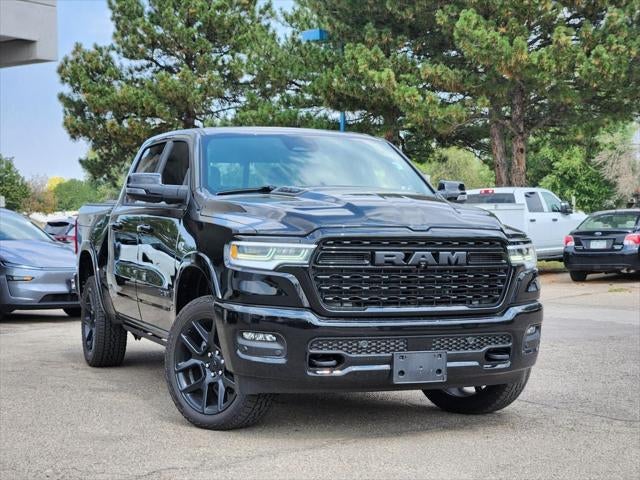 2026 RAM 1500 RAM 1500 LIMITED CREW CAB 4X4 5'7' BOX in Diamond Black Crystal Pearl-Coat Exterior Paint — front three-quarter view