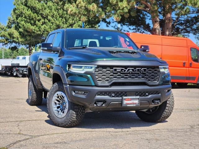 2026 RAM 1500 RAM 1500 RHO CREW CAB 4X4 5'7' BOX in Serrano-Green Metallic Exterior Paint — front three-quarter view