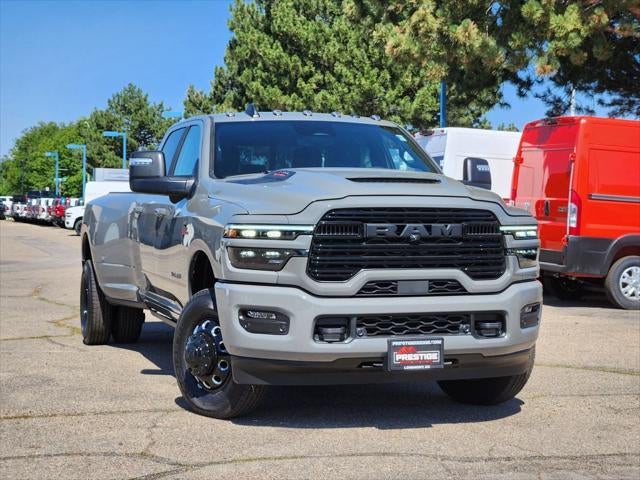 2026 RAM 3500 RAM 3500 LARAMIE CREW CAB 4X4 8' BOX in Ceramic Gray Clear-Coat Exterior Paint — front three-quarter view