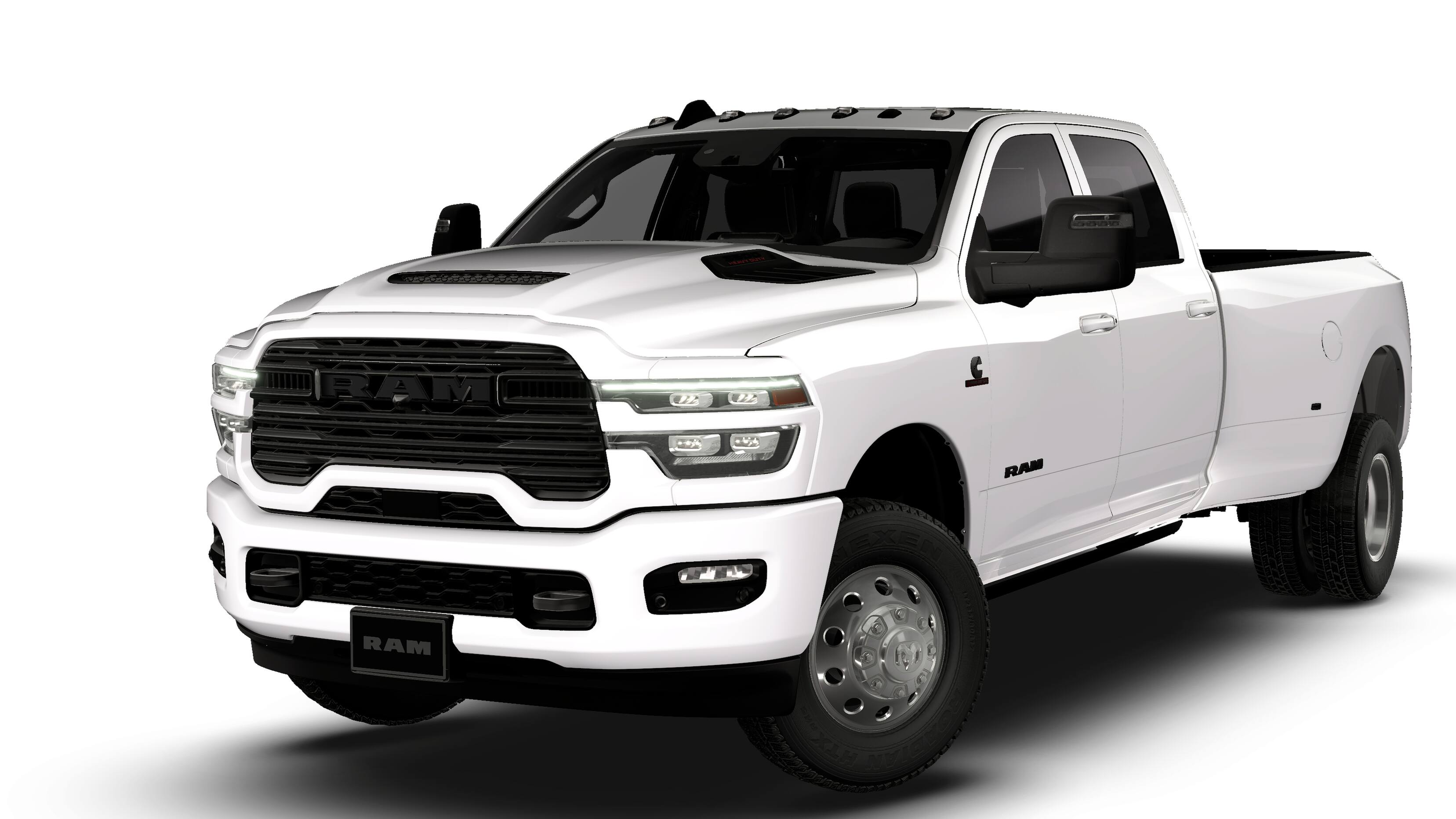 2026 RAM 3500 RAM 3500 LARAMIE CREW CAB 4X4 8' BOX in Bright White Clear-Coat Exterior Paint — front three-quarter view