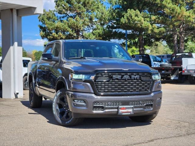 2026 RAM 1500 RAM 1500 BIG HORN CREW CAB 4X4 5'7' BOX in Granite Crystal Metallic Clear-Coat Exterior Paint — front three-quarter view