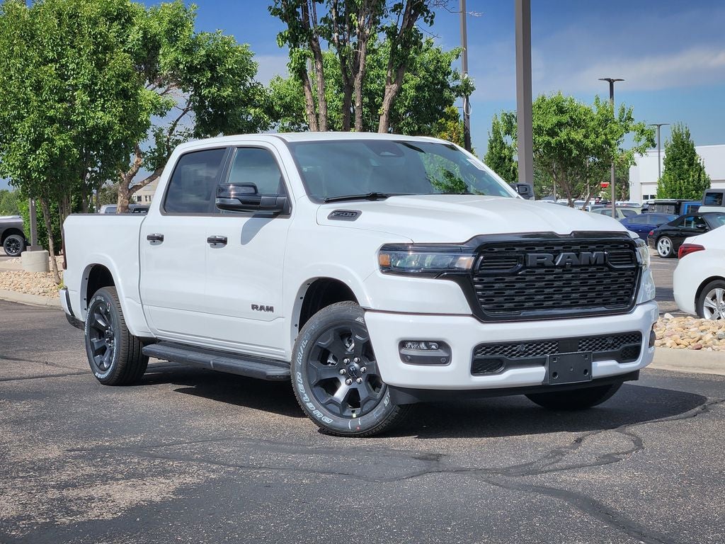 2026 RAM 1500 RAM 1500 BIG HORN CREW CAB 4X4 5'7' BOX in Bright White Clear-Coat Exterior Paint — front three-quarter view